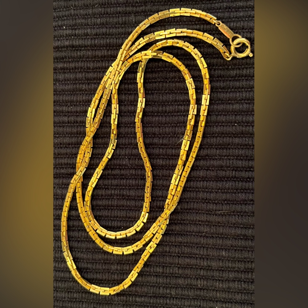 Intricate Gold Braided Necklace with Rich Tone